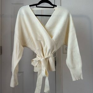 Cream ribbed v/neck sweater with waist tie